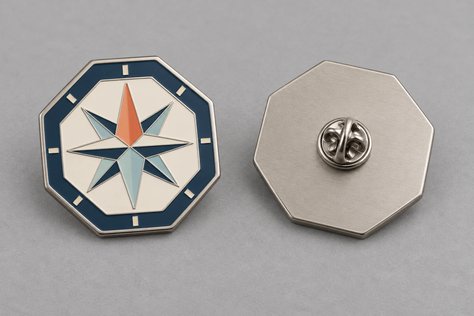 Front and reverse views of an octagonal compass pin, with its butterfly clutch attached.